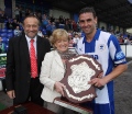 Champions wave goodbye with win